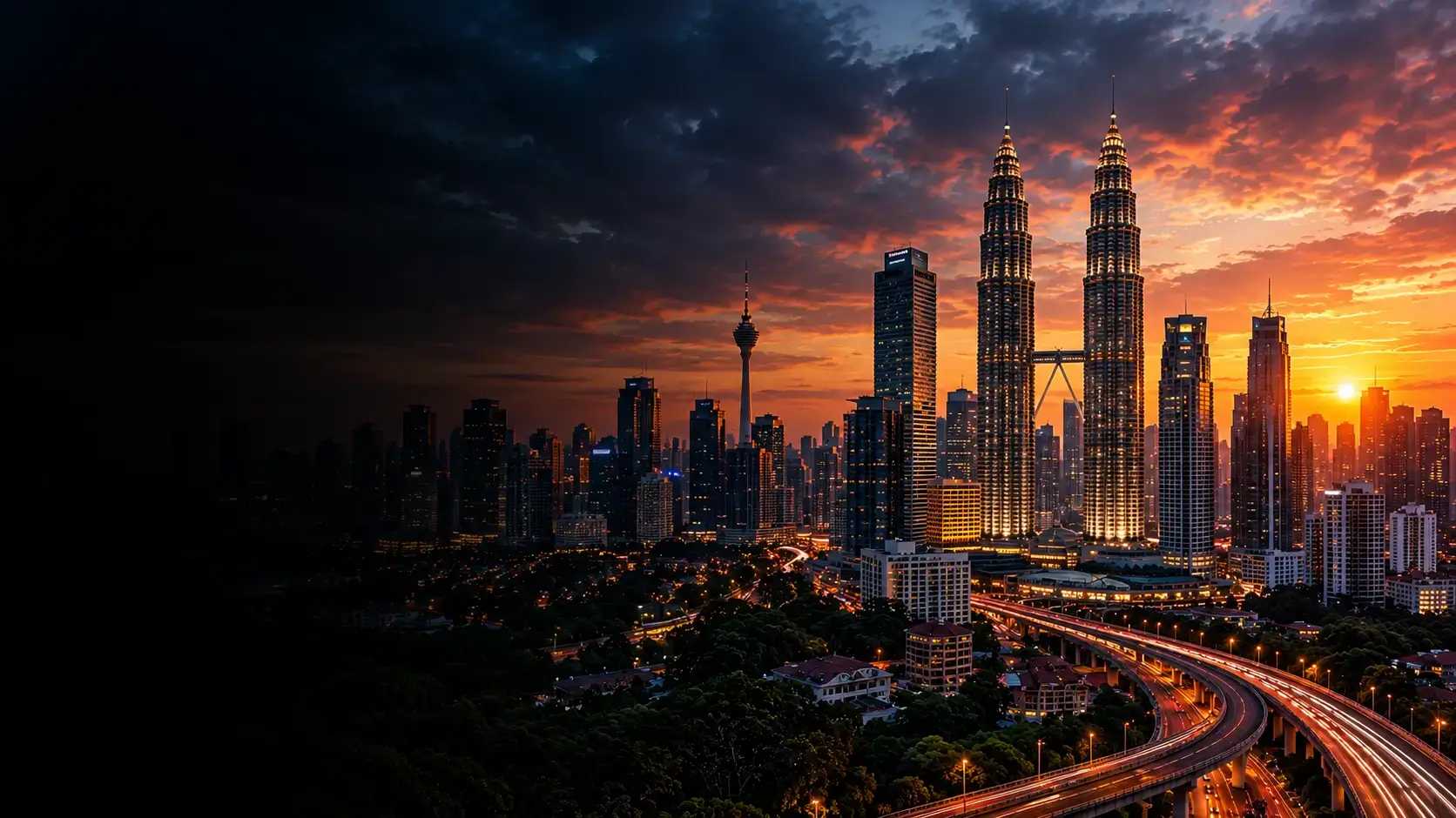 Kuala Lumpur skyline at sunset with the Petronas Twin Towers and a busy highway